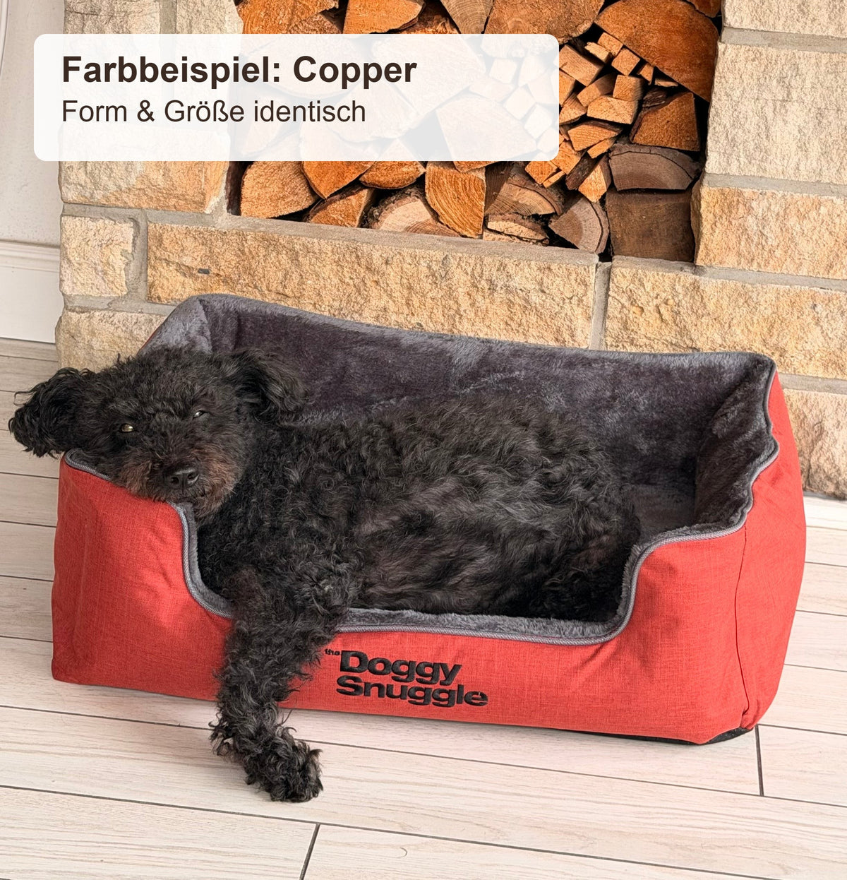 Farbbeispiel in Copper: Hündin Lucy liegt im Doggy Snuggle Strong Hundekörbchen – Form und Größe wie bei dieser Farbe