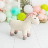 Gehäkeltes Stofftier Einhorn in Weiß und Rosa von Crochetts