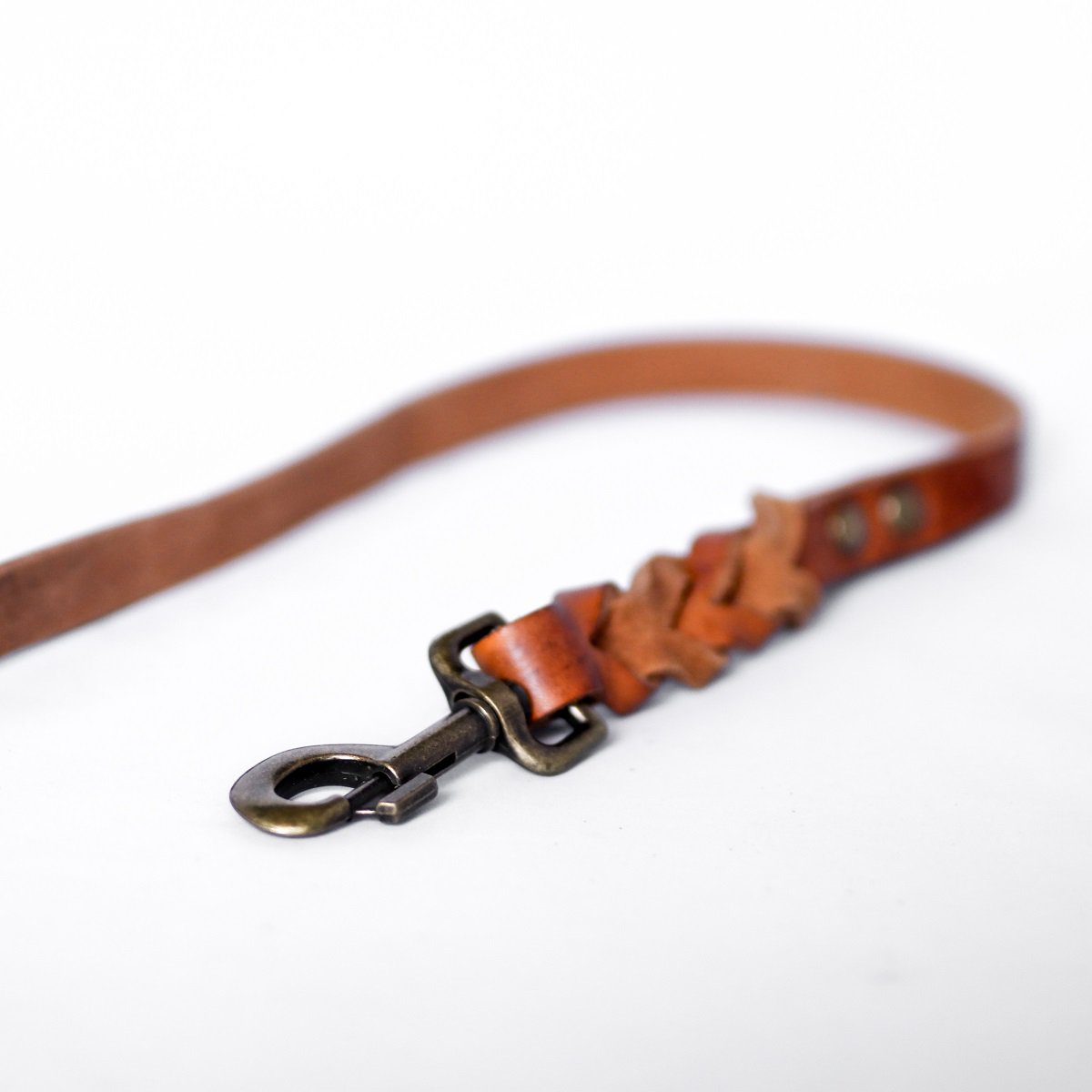Geflochtene Lederleine TWISTED in Cognac von Cooper &amp; Quint