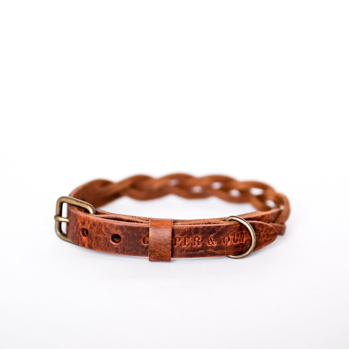 Geflochtenes Lederhalsband TWISTED in Braun von Cooper &amp; Quint