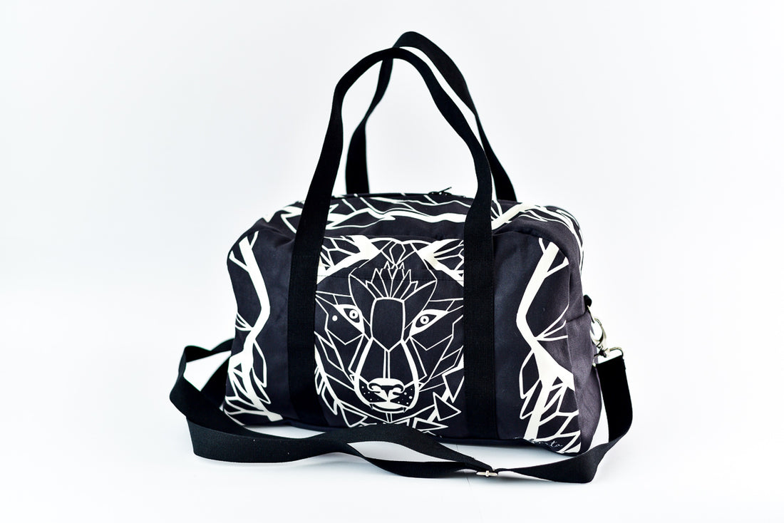 Reisetasche Wolf in Schwarz und Weiß
